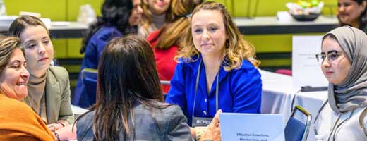 Women attending a session at a CHEST Annual Meeting